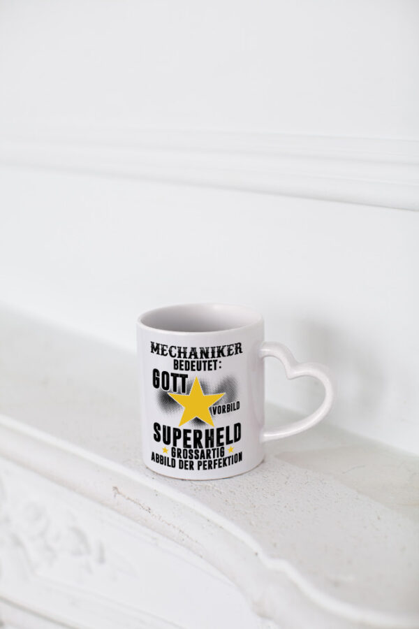 Bedeutung von Mechaniker | KFZ | Werkstatt - Herzhenkel Tasse - Kaffeetasse / Geschenk / Familie