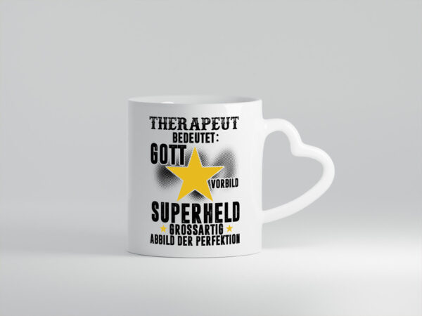 Bedeutung von Therapeut | Psychotherapie | Therapie - Herzhenkel Tasse - Kaffeetasse / Geschenk / Familie