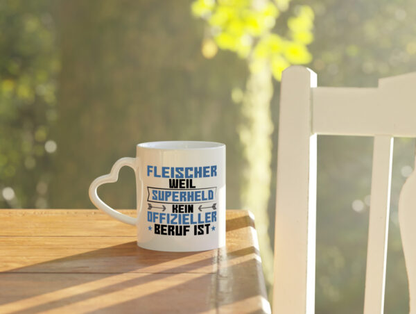 Superheld Fleischer | Schlachterei - Herzhenkel Tasse - Kaffeetasse / Geschenk / Familie