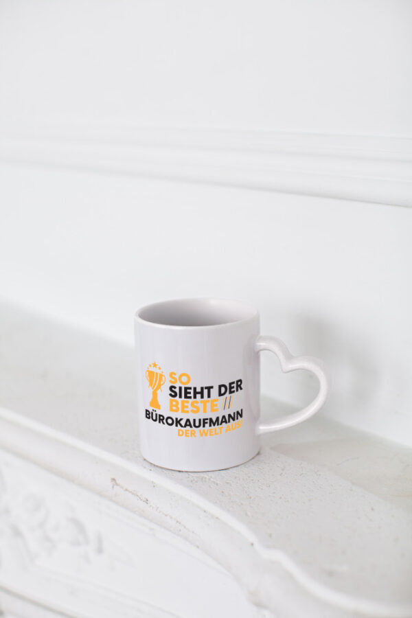 Der Weltbeste Bürokaufmann | Kaufmann - Herzhenkel Tasse - Kaffeetasse / Geschenk / Familie