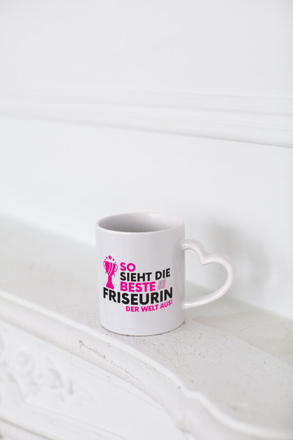Die Weltbeste Friseurin | Friseuse | Frisörin - Herzhenkel Tasse - Kaffeetasse / Geschenk / Familie