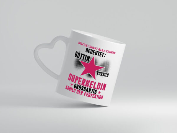 Bedeutung von Heizungsinstallateurin | Heizung - Herzhenkel Tasse - Kaffeetasse / Geschenk / Familie