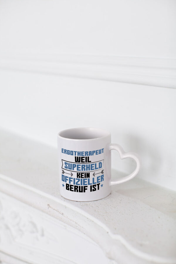 Superheld Ergotherapeut | Ergotherapie - Herzhenkel Tasse - Kaffeetasse / Geschenk / Familie
