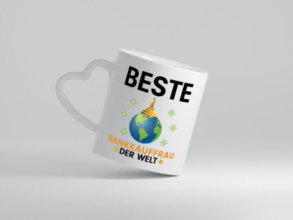 Welt Beste Bankkauffrau | Kauffrau | Bank Kaufleute - Herzhenkel Tasse - Kaffeetasse / Geschenk / Familie