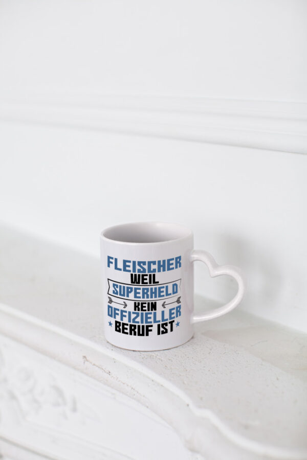 Superheld Fleischer | Schlachterei - Herzhenkel Tasse - Kaffeetasse / Geschenk / Familie