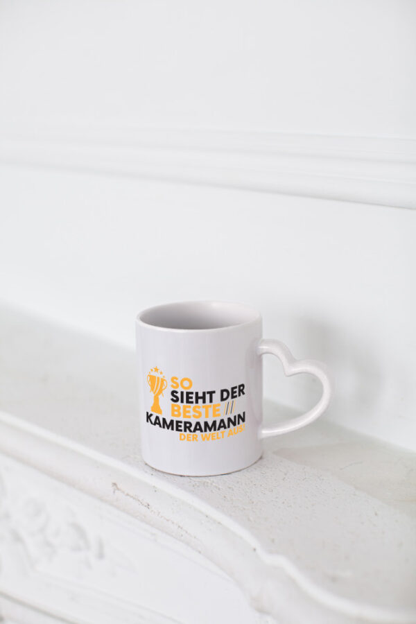 Der Weltbeste Kameramann | Kamera - Herzhenkel Tasse - Kaffeetasse / Geschenk / Familie