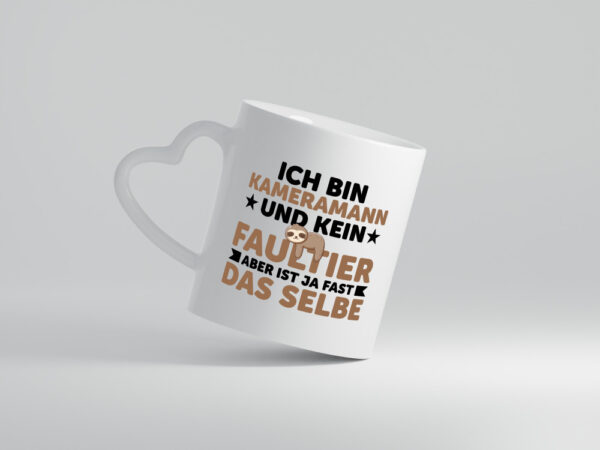 Ich bin kein Faultier: Kameramann | Kamera - Herzhenkel Tasse - Kaffeetasse / Geschenk / Familie