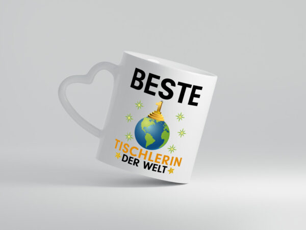 Welt Beste Tischlerin | Tischlerei - Herzhenkel Tasse - Kaffeetasse / Geschenk / Familie