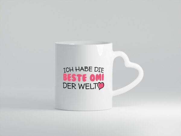 Beste Omi der Welt | Oma Tasse | Geburtstag | Muttertag - Herzhenkel Tasse - Kaffeetasse / Geschenk / Familie