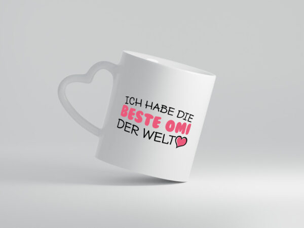 Beste Omi der Welt | Oma Tasse | Geburtstag | Muttertag - Herzhenkel Tasse - Kaffeetasse / Geschenk / Familie