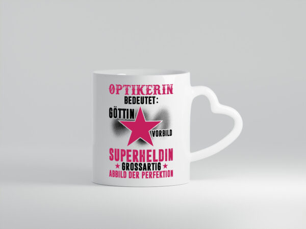 Bedeutung von Optikerin | Augenoptik - Herzhenkel Tasse - Kaffeetasse / Geschenk / Familie