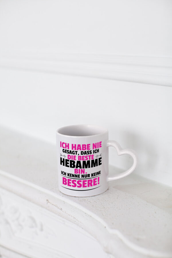Die Beste Hebamme | Geburtshilfe - Herzhenkel Tasse - Kaffeetasse / Geschenk / Familie