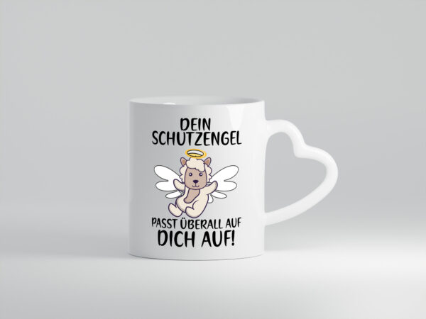 Dein Schutzengel passt auf | Sheepworld | Schaf | Comic - Herzhenkel Tasse - Kaffeetasse / Geschenk / Familie