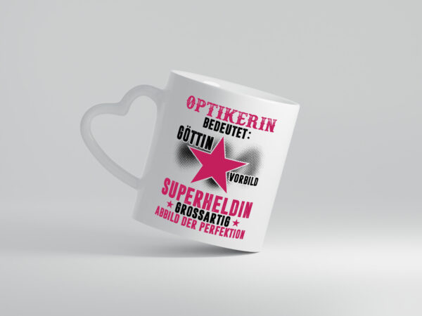 Bedeutung von Optikerin | Augenoptik - Herzhenkel Tasse - Kaffeetasse / Geschenk / Familie