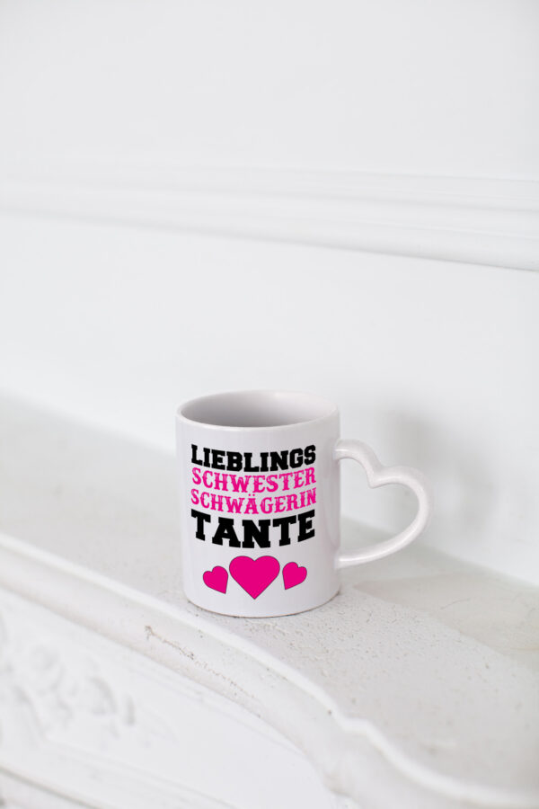 Lieblings Schwester - Herzhenkel Tasse - Kaffeetasse / Geschenk / Familie