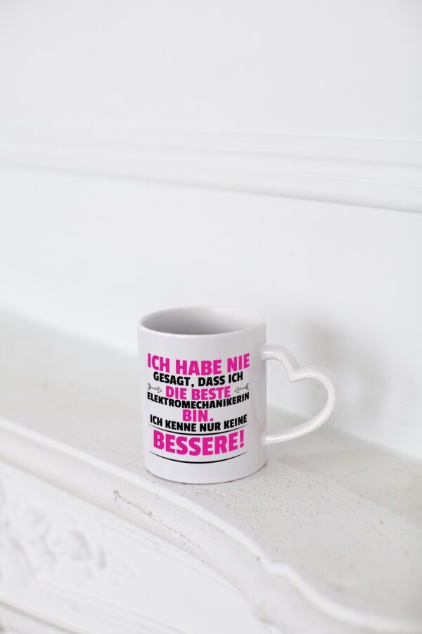 Die Beste Elektromechanikerin | Mechanikerin - Herzhenkel Tasse - Kaffeetasse / Geschenk / Familie