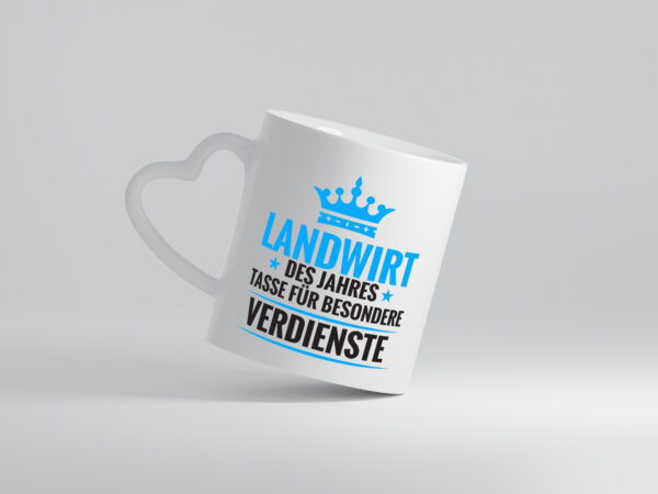 Besonderer Verdienst: Landwirt | Bauer | Landwirtschaft - Herzhenkel Tasse - Kaffeetasse / Geschenk / Familie