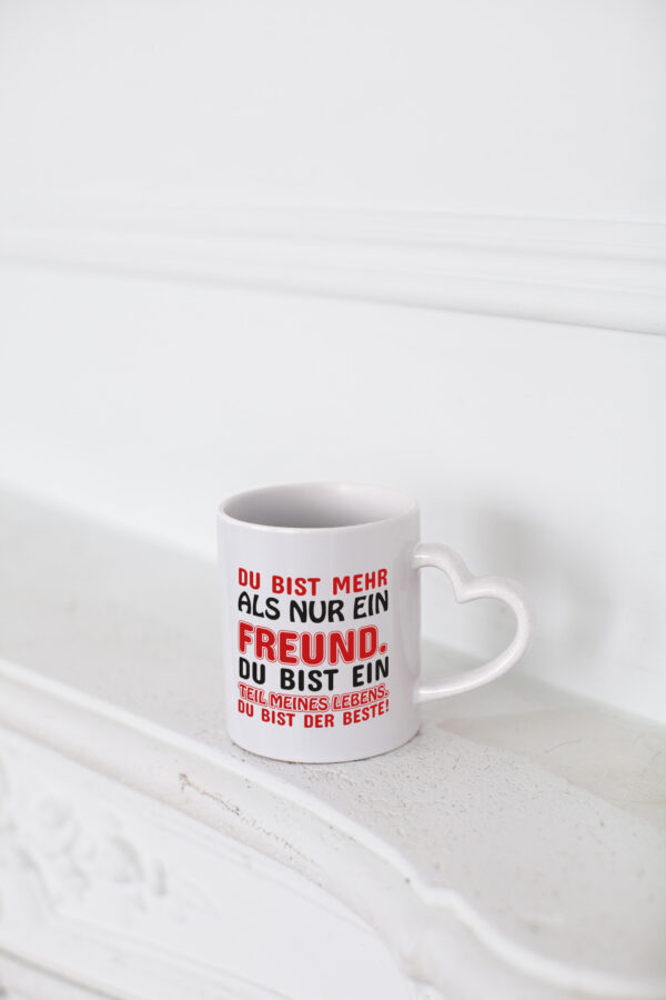 Mehr als nur ein Freund | Bester Freund | Freundschaft - Herzhenkel Tasse - Kaffeetasse / Geschenk / Familie