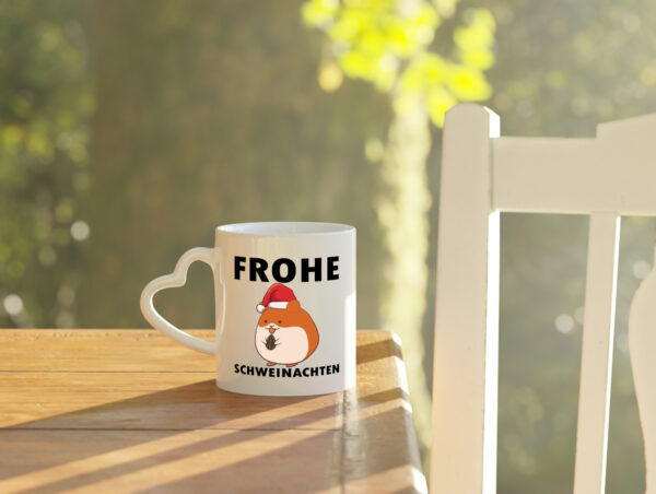 Frohe Schweinachten | Meerschweinchen | Weihnachten - Herzhenkel Tasse - Kaffeetasse / Geschenk / Familie