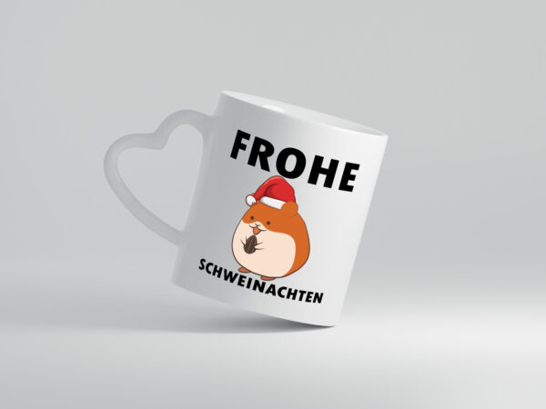 Frohe Schweinachten | Meerschweinchen | Weihnachten - Herzhenkel Tasse - Kaffeetasse / Geschenk / Familie