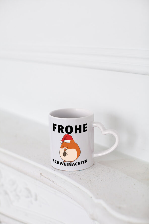 Frohe Schweinachten | Meerschweinchen | Weihnachten - Herzhenkel Tasse - Kaffeetasse / Geschenk / Familie